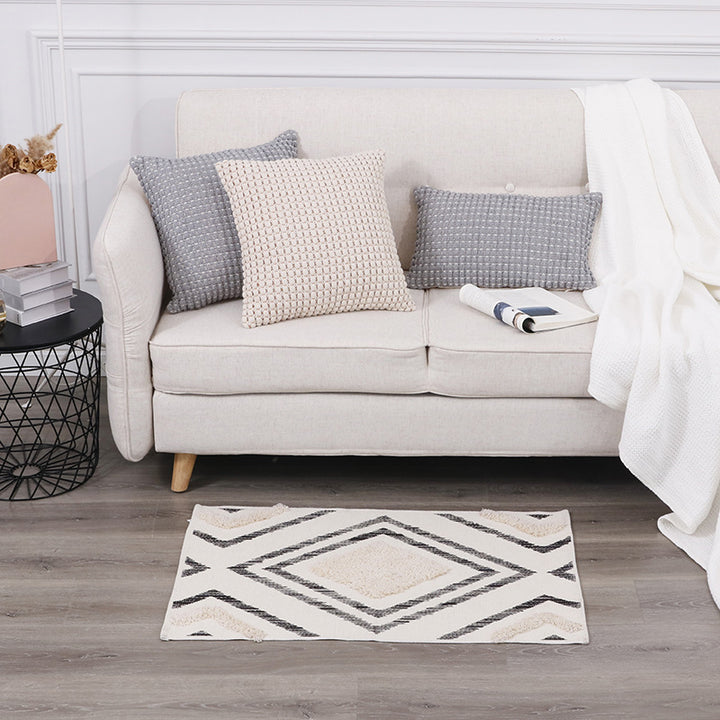 Short-pile bathroom and living rug with geometric diamond pattern and anti-slip backing