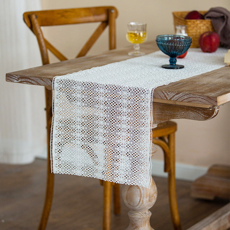 Delicate lace runner in vintage Hardanger style for dining table and sideboard