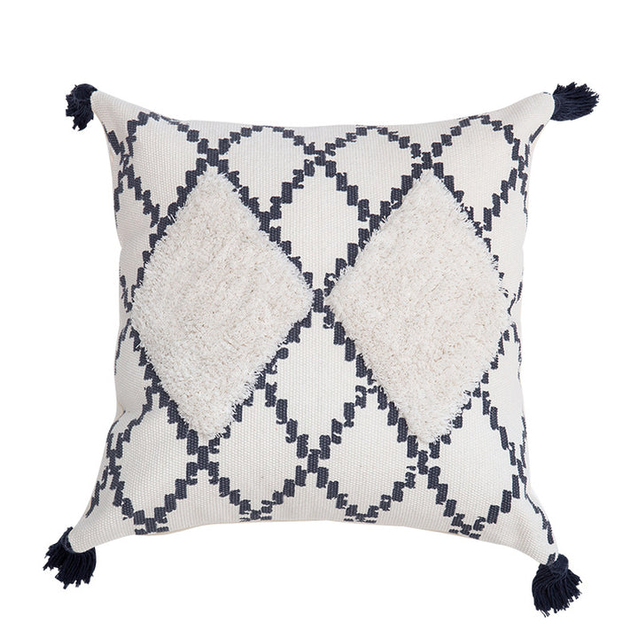Decorative Boho cushion cover with hand-tufted diamond relief, tassels, and woven cotton blend