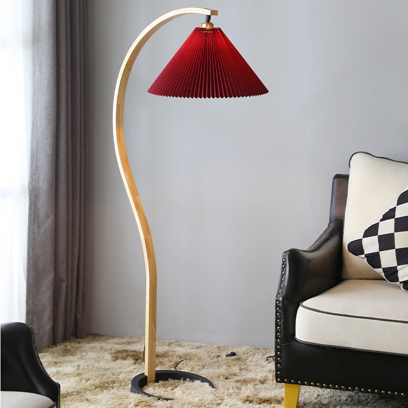Curved wooden floor lamp