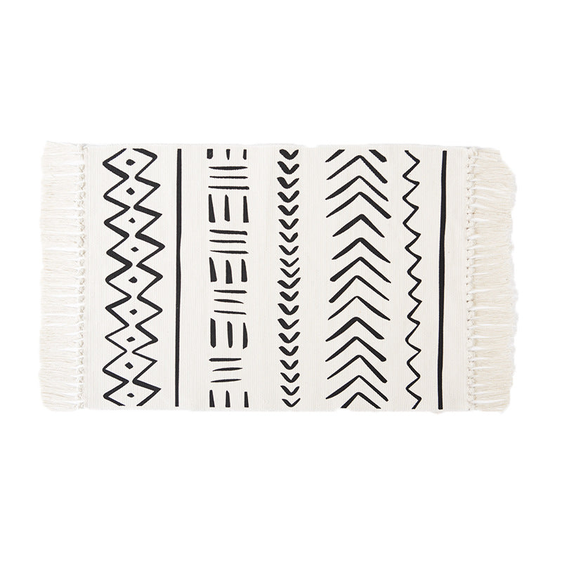 Flat-woven cotton runner with Boho-Ethno motif and decorative fringes