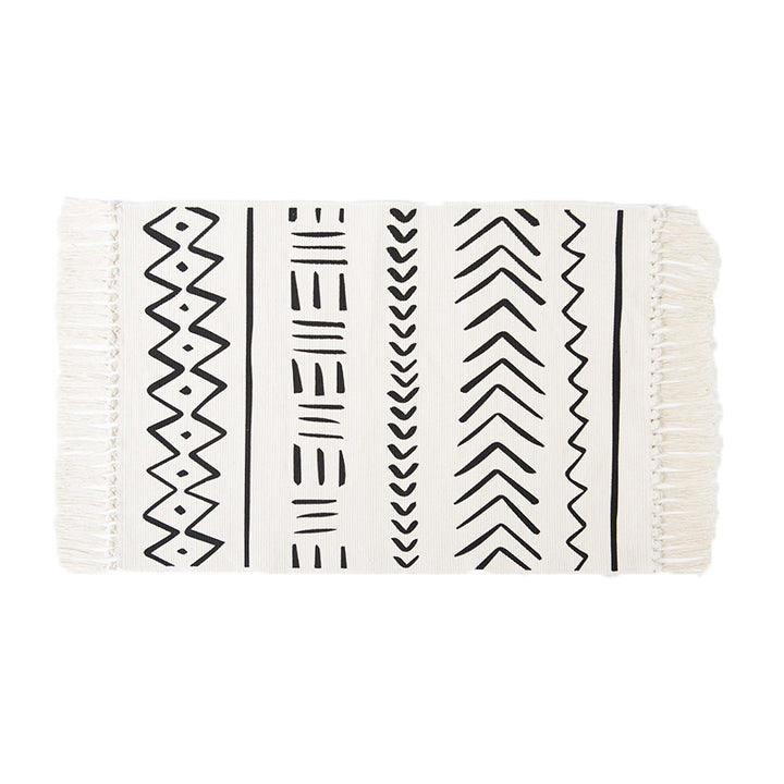 Flat-woven cotton runner with Boho-Ethno motif and decorative fringes