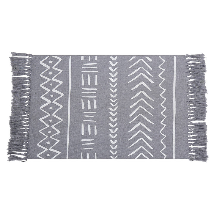Flat-woven rug runner in Boho Mudcloth design with cotton fringes