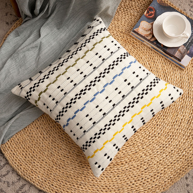 Woven square decorative cushion cover with decorative embroidered stripes made of cotton blend