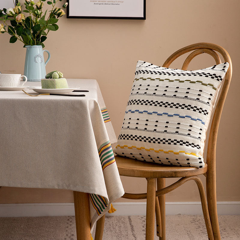 Woven square decorative cushion cover with decorative embroidered stripes made of cotton blend