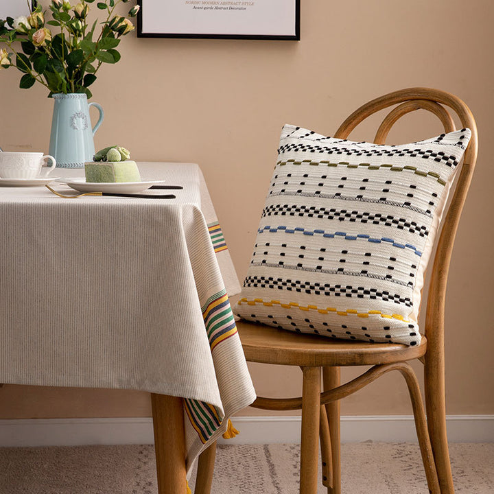 Woven square decorative cushion cover with decorative embroidered stripes made of cotton blend
