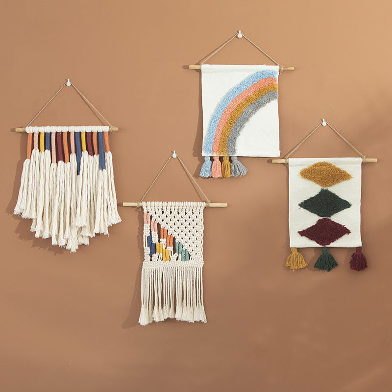 Handcrafted macrame wall hanging with colorful cotton fringes and wooden rod