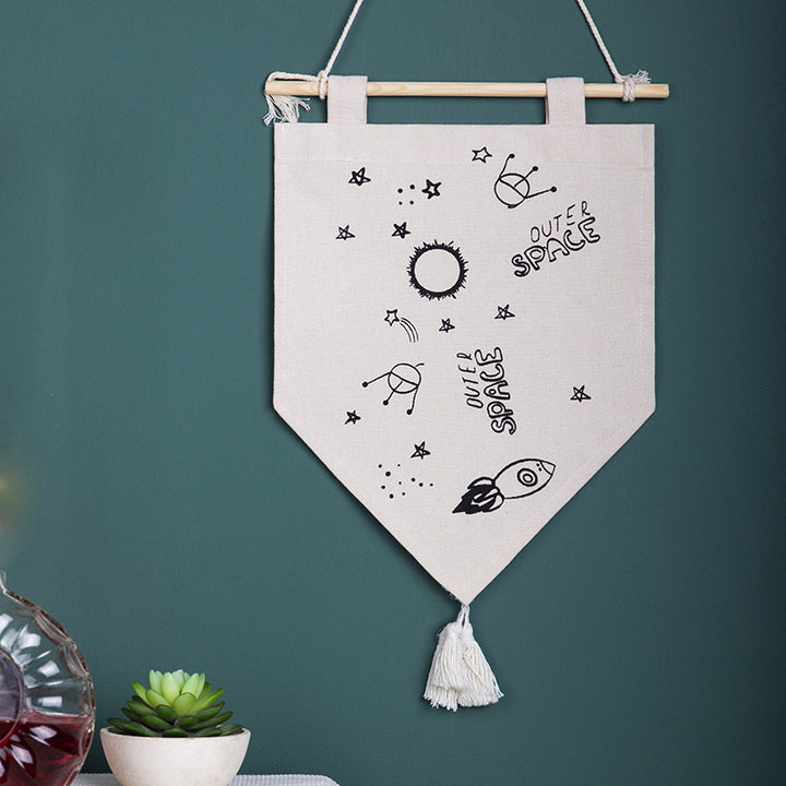 Decorative cotton wall hanging in pennant style with tassels and minimalist prints