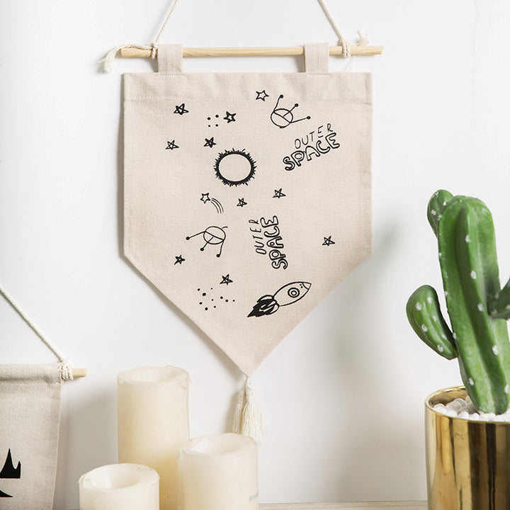 Decorative cotton wall hanging in pennant style with tassels and minimalist prints
