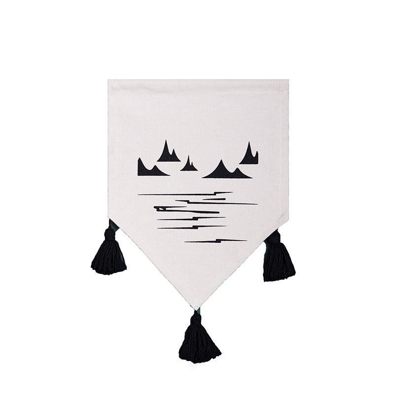 Decorative cotton wall hanging in pennant style with tassels and minimalist prints