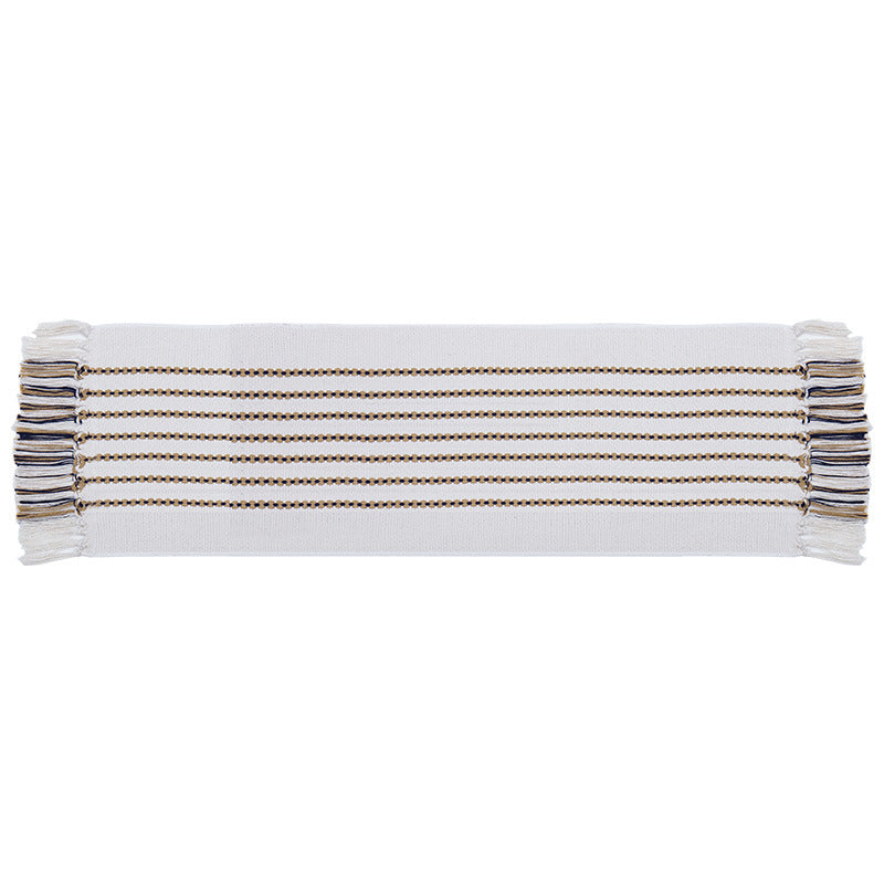 Decorative table runner in Scandinavian-minimalist design with macrame fringes