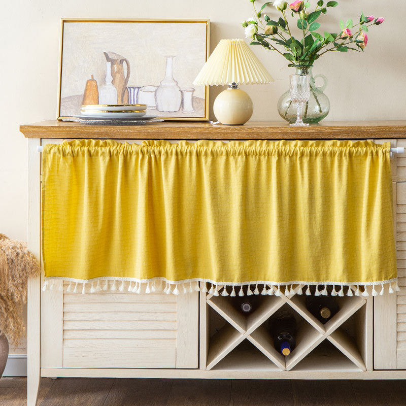 Short curtain with tassel border and rod passage