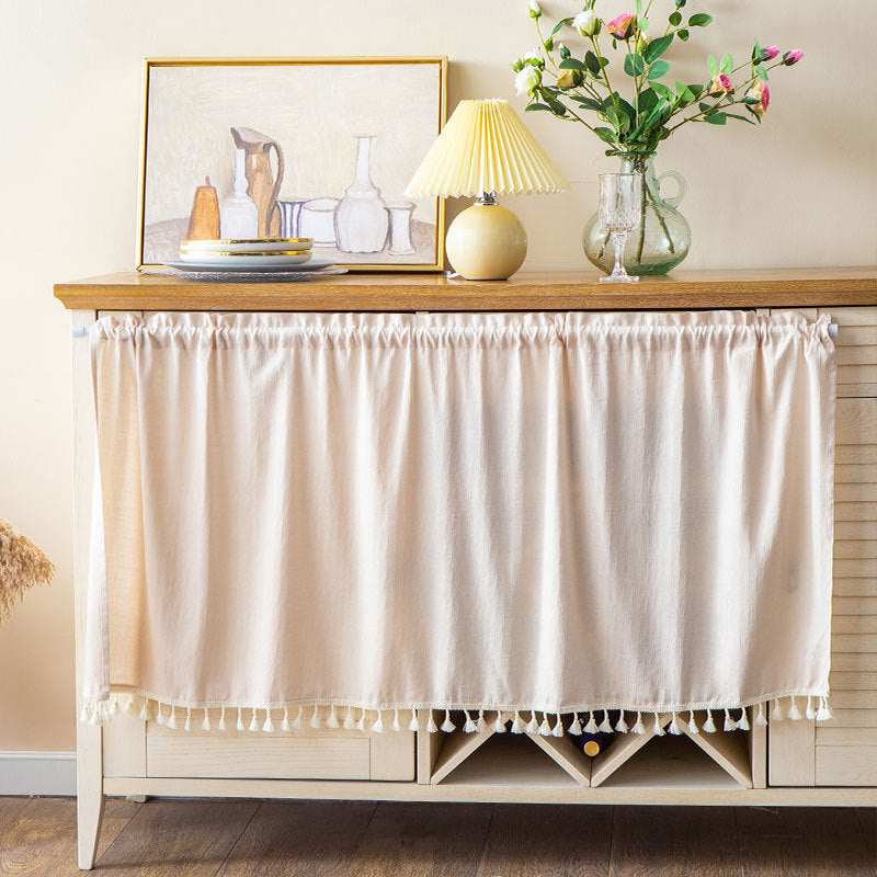 Short curtain with tassel border and rod passage