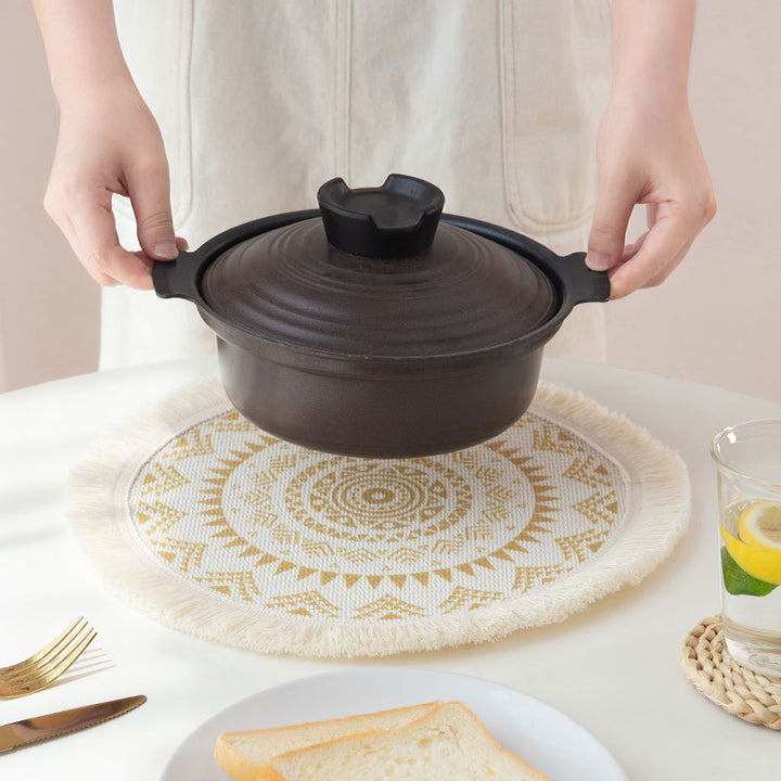 Round woven placemat with fringes and mandala jacquard structure