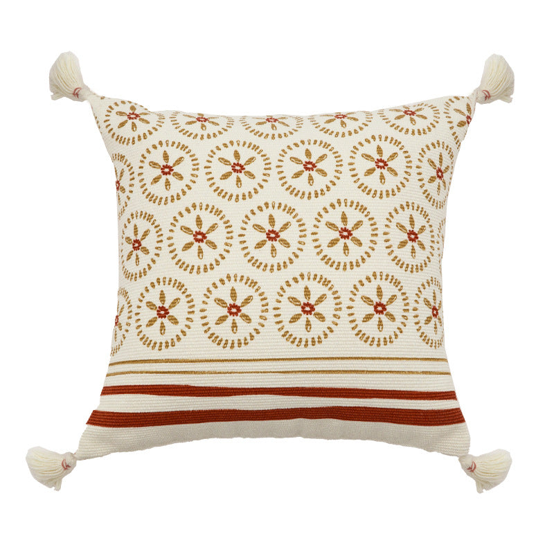 Decorative cushion cover with woven medallion pattern and tassels