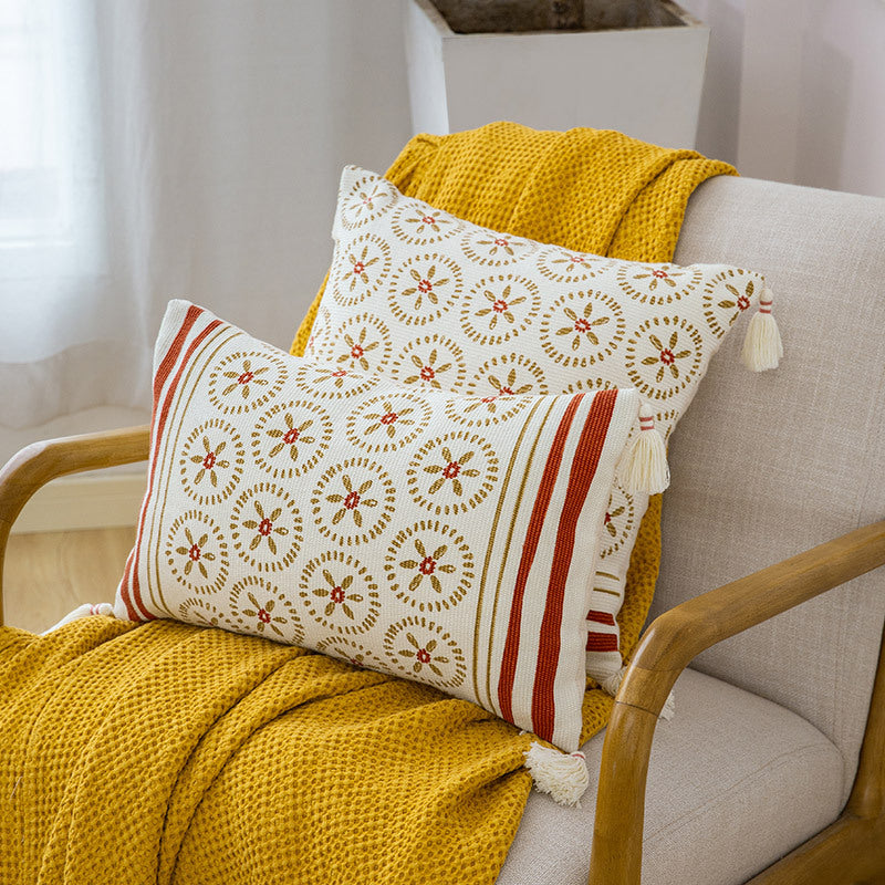 Square embroidered cotton pillowcase with tassels and woven circle ornament