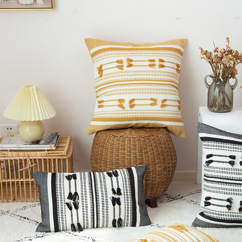 Handwoven square decorative cushion cover with tuft appliqués and boho stripes