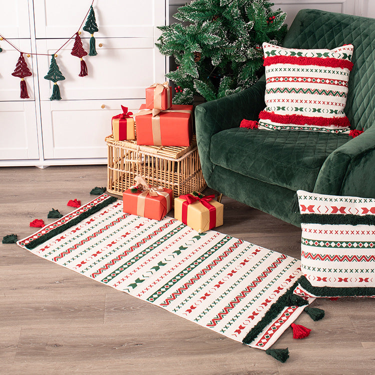 Flat-woven runner rug with Nordic Christmas pattern, tassels and cotton blend