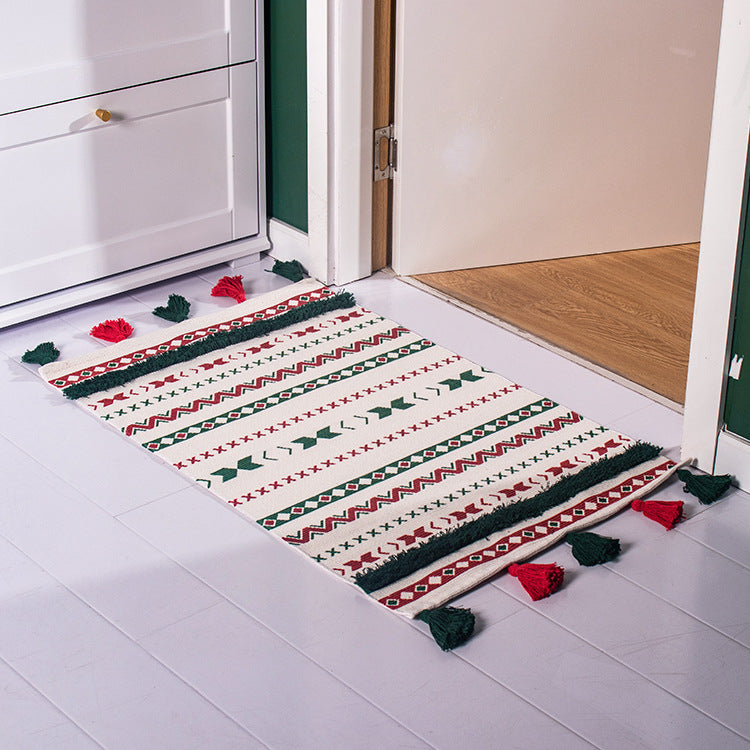 Flat-woven runner rug with Nordic Christmas pattern, tassels and cotton blend