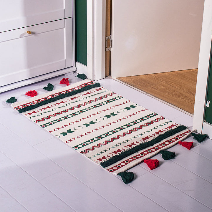 Flat-woven runner rug with Nordic Christmas pattern, tassels and cotton blend