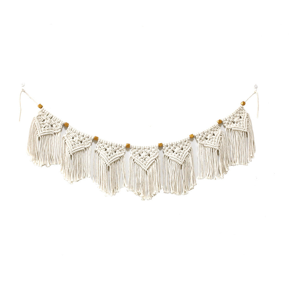 Decorative macrame wall hanging with ornate fringes