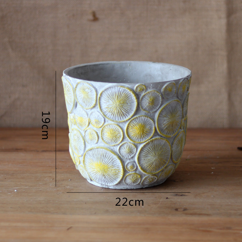 Decorative flower vase made of ceramic with relief structure