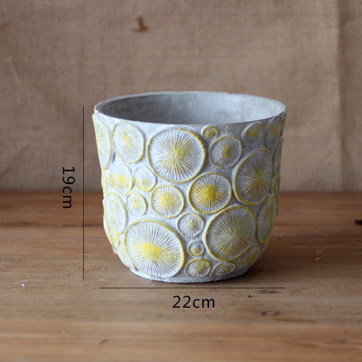 Decorative flower vase made of ceramic with relief structure