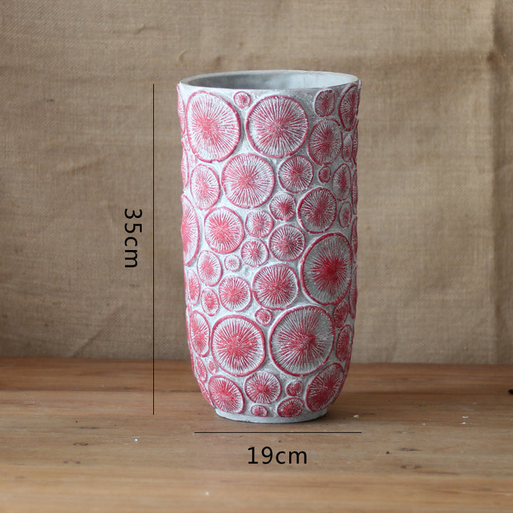 Decorative flower vase made of ceramic with relief structure