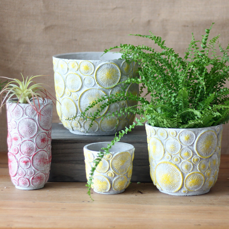 Decorative flower vase made of ceramic with relief structure