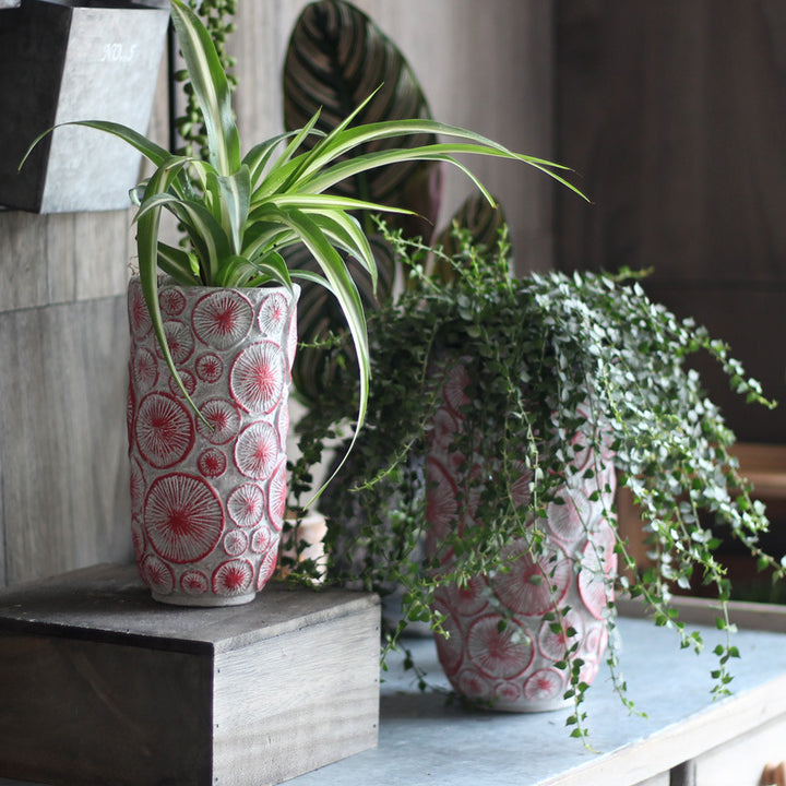Decorative flower vase made of ceramic with relief structure