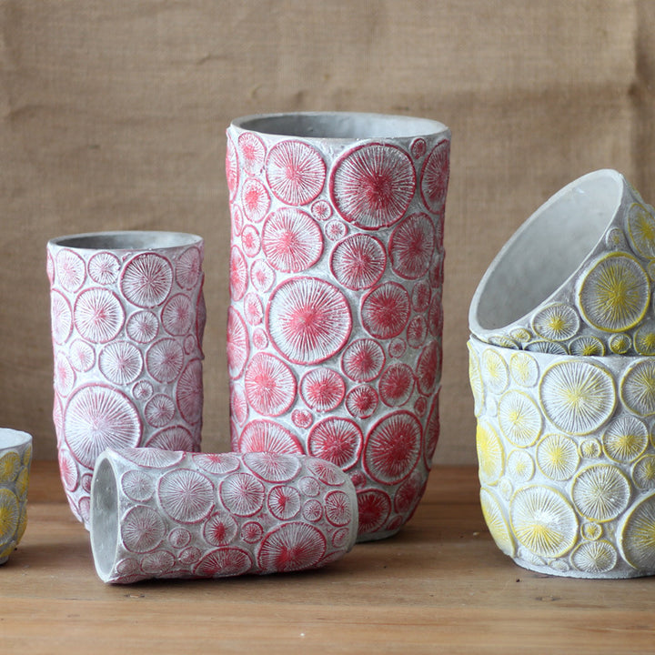Decorative flower vase made of ceramic with relief structure