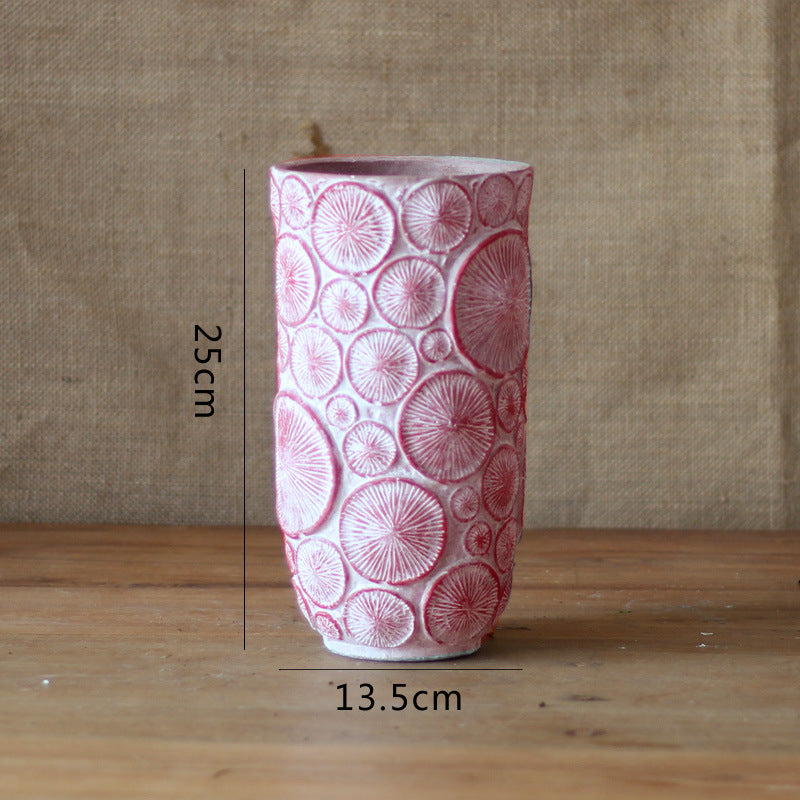 Decorative flower vase made of ceramic with relief structure
