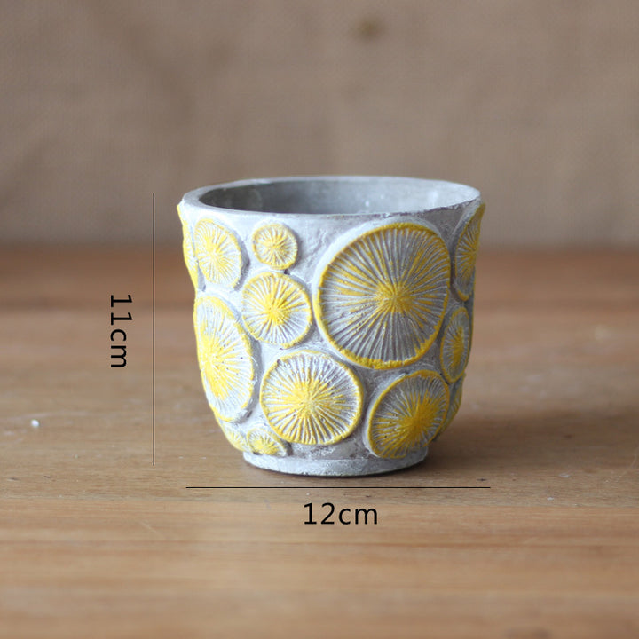 Decorative flower vase made of ceramic with relief structure