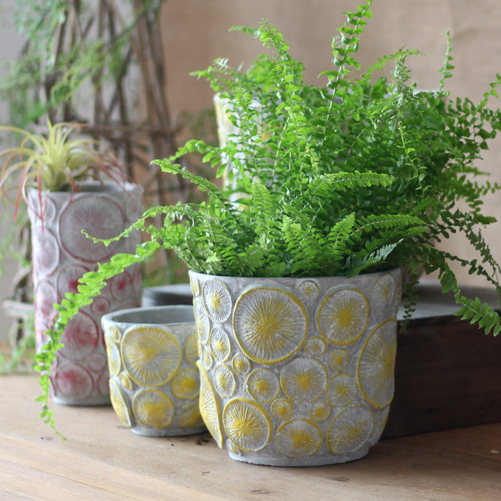 Decorative flower vase made of ceramic with relief structure