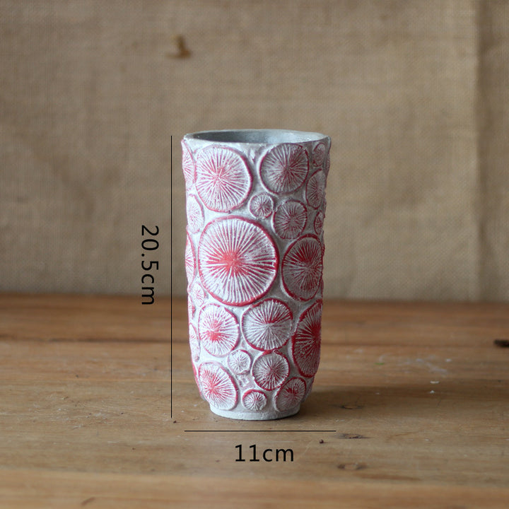 Decorative flower vase made of ceramic with relief structure