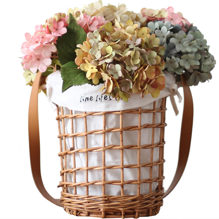 Practical basket with carrying strap