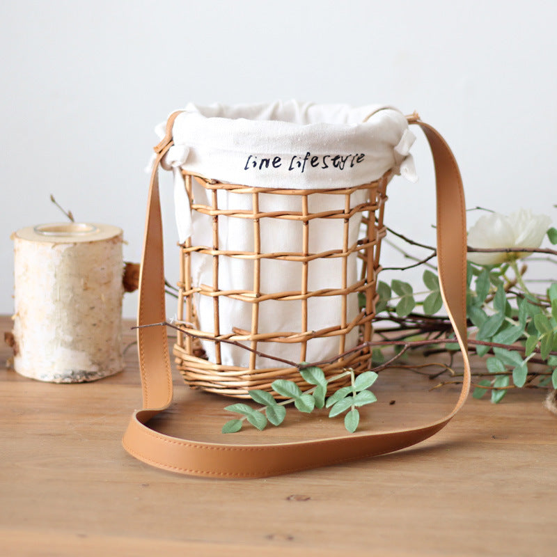 Practical basket with carrying strap