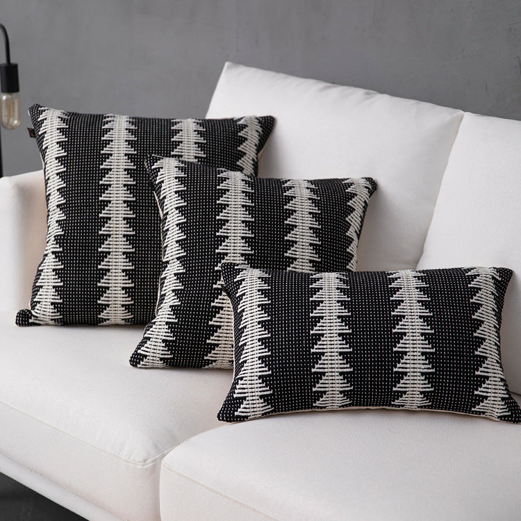 Decorative woven cushion cover with ethnic jacquard, tassels and concealed zipper