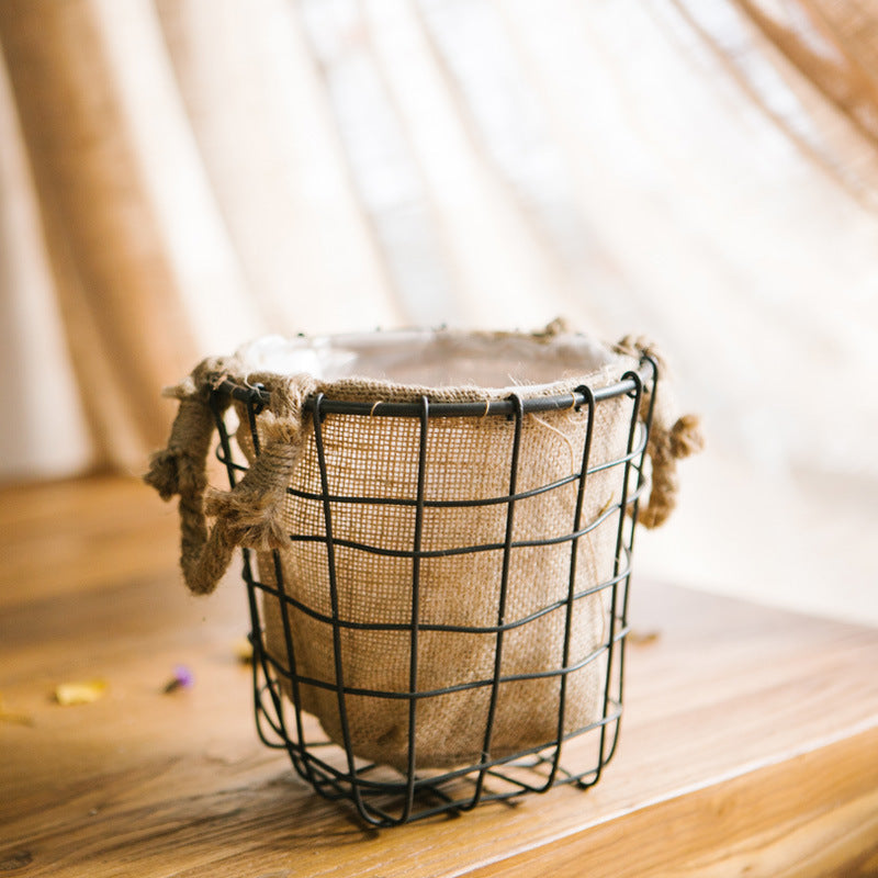 Decorative storage basket with jute lining