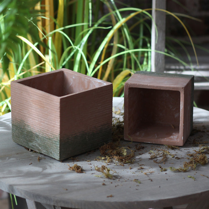 Decorative flower pot with woven design