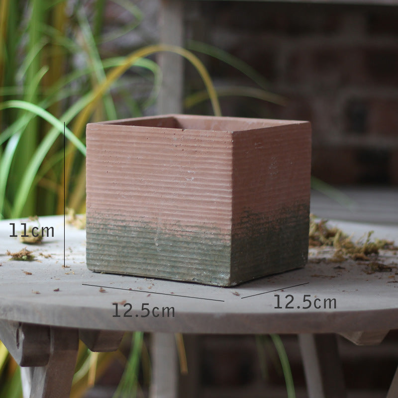 Decorative flower pot with woven design