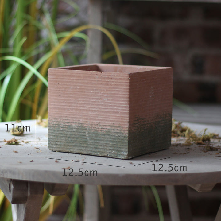 Decorative flower pot with woven design