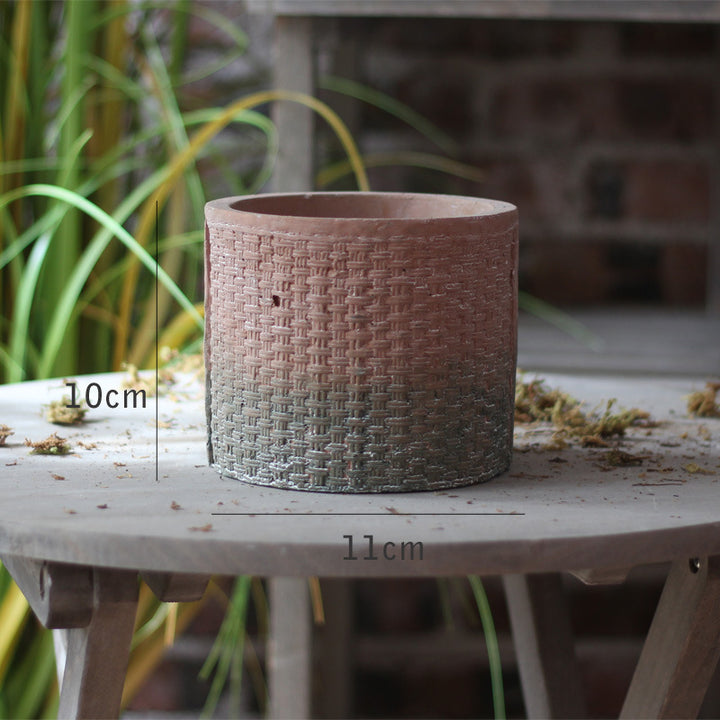 Decorative flower pot with woven design