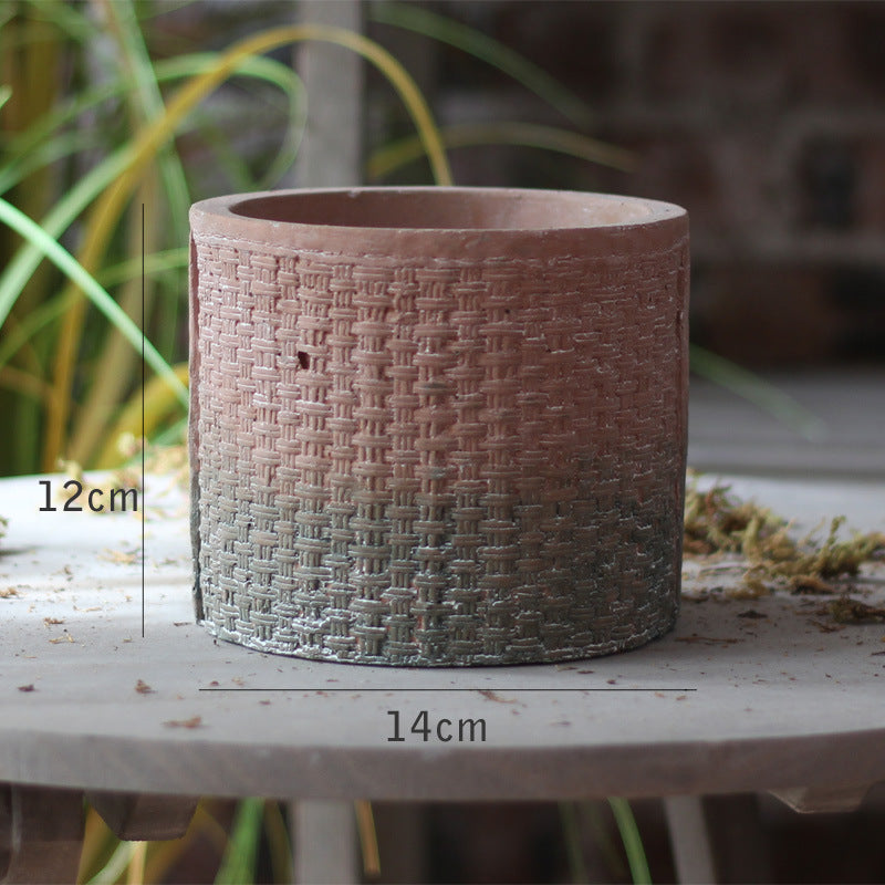 Decorative flower pot with woven design