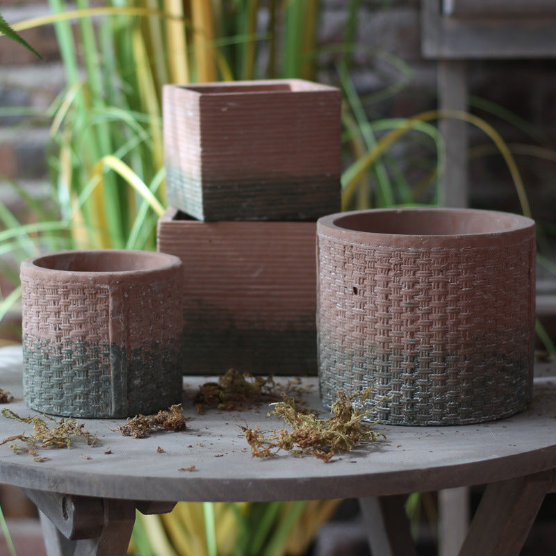 Decorative flower pot with woven design