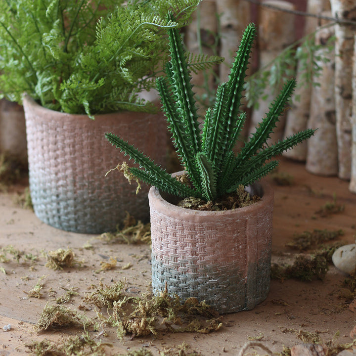 Decorative flower pot with woven design