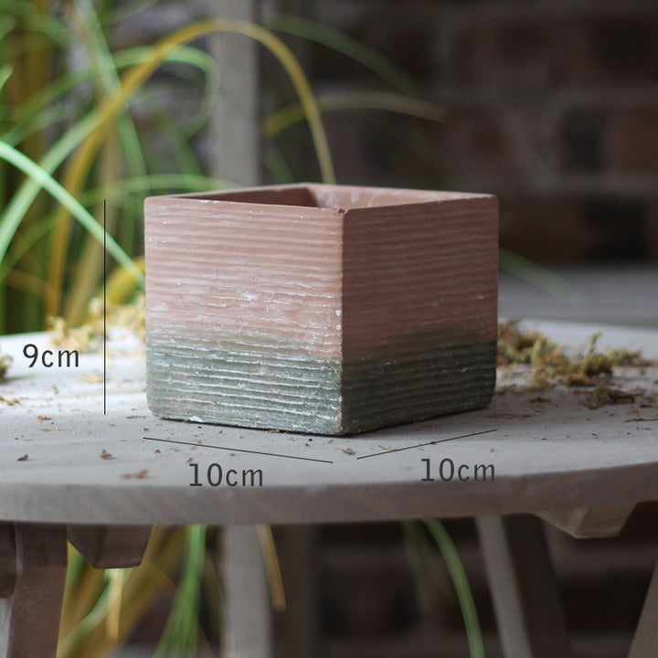 Decorative flower pot with woven design