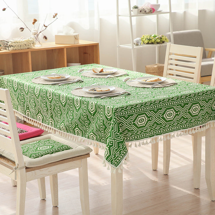 Woven cotton tablecloth with ethnic jacquard pattern and tassel trim
