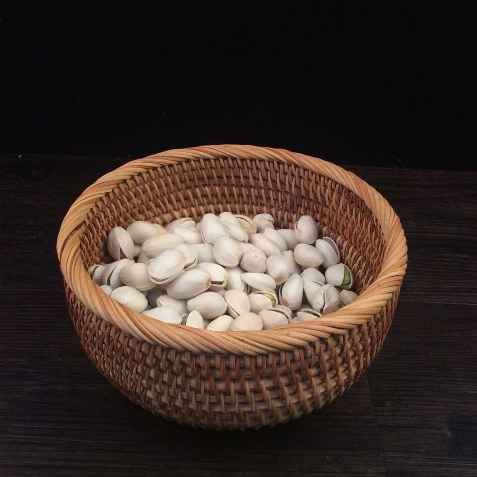 Handcrafted decorative fruit basket made of rattan