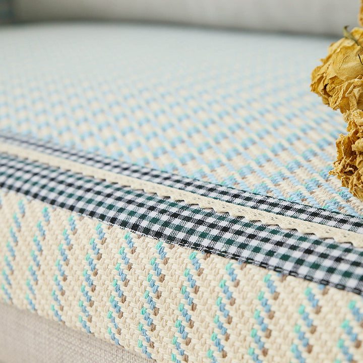 Handwoven breathable mattress topper with checkered decorative ribbon